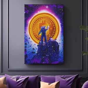 May include: An astronaut stands on a rocky outcrop in a starry, purple and blue galaxy. The astronaut is reaching towards a large, gold Bitcoin coin with the words "Bitcoin Digital Cryptocurrency" around the edge.