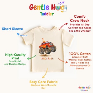 以下が含まれることがあります： クリーム色の幼児用Tシャツ。赤とオレンジ色のモンスターカーのグラフィック。トラックは大きな車輪と誕生日の帽子付き。名前「ANDERSON」が下に印刷されています。半袖、クルーネック。テキスト「Gentle Hug Toddler」。