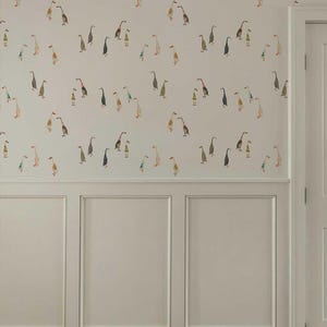 a wall with a repeating pattern of ducks in various colors and sizes, creating a vibrant and lively wallpaper design.