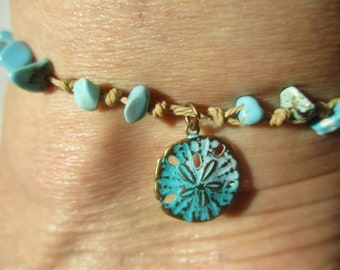 Sand Dollar Anklet. Brass and Turquoise Painted. Knotted on Beige cord 5mm Turquoise Howlite Gemstone beads Adjusts to any size Waterproof.