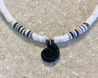 Puca Shell Necklace with tiny Silicone, Silver and a Czech Glass Ammonite centered Pendant. Necklace measures 18” with a 3” chain extension.