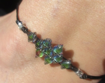 Anklet Diamond Rainbow Colored Czech Glass Beads. Silver Plated Spacers. Hand Knotted on Black Cord that adjusts in size and is Waterproof.