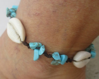 Anklet Cowrie Shell and Turquoise howlite Gemstone beads. Hand Knotted on Brown Cord that is both Waterproof and Adjustable in size 9"- 14".