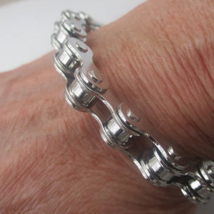 Bicycle Chain Bracelet. Silver Plated Metal Chain Links. Links Measure 1/2” in Width and 8”up to a 8 1/2&quot; in Length only.