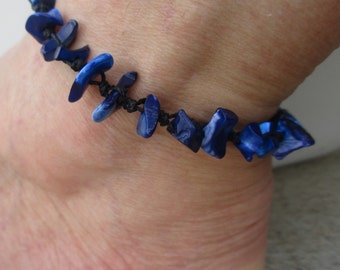 Anklet Deep Blue Shell beads. Hand Knotted on Black Cord that Adjusts in size from 10 3/4" up to 14". Waterproof. Non Metal.