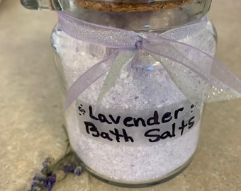 Lavender Bath Salts. 15 ounces. Ingredients Incl: Sweet Almond Oil, Epsom Salt, Dead Sea Salt. Pure Lavender Essential Oil. Glass jar.