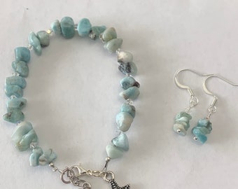 Larimar Beaded Bracelet.Starfish charm with Aurora Borealis Swarovski Crystals. Matching Earrings set. Silver plated clasp and ear wires.