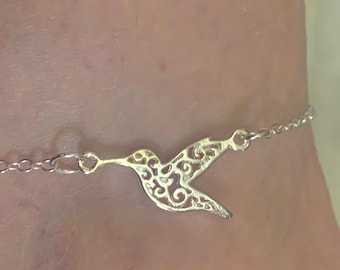 Hummingbird Anklet. Silver Plate Anklet. Measures 8.5 “ up to 9.5”. Can add more chain if necessary. Hummingbird measures 1” L. and 1/2” W.