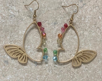 Butterfly Earrings. Gold Butterflies with Genuine Swarovski Tiny Rainbow Crystals.  Gold plated ear wires. Earrings dangle to about 2”.