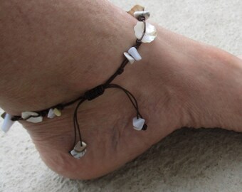 Anklet  Mother of Pearl Shell Flower and chip beads. Hand Knotted on Brown cord. Adjusts  in size from 10-14". Waterproof. Non Metal Anklet.