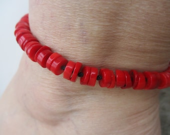 Anklet Coral Red 6 mm disc beads. Hand knotted on Black Cord. Adjusts in size from a 10 "up to 15". Waterproof. Non Metal. Genuine Coral.