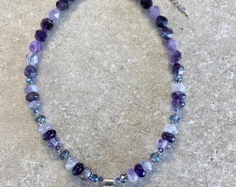 Amethyst  Silver and Crystal Necklace. Genuine Amethyst Beads with a Hill Tribe Silver Focal Pendant and Swarovski Crystals. Measures 17-20”