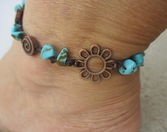 Anklet turquoise howlite gemstone beads with Copper flower Accent Bead. Hand knotted. Strung on brown cord. Adjustable in size waterproof.