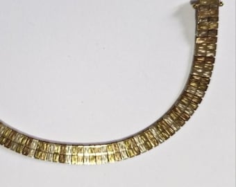 Pulseira dourada tricolor