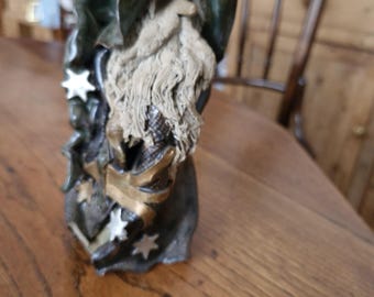 Ceramic sculpture of a Magician