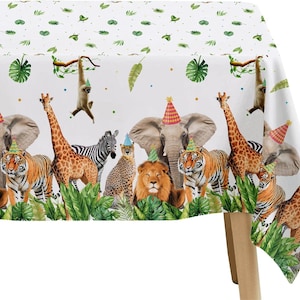 May include: White tablecloth featuring a jungle animal theme. The design includes elephants, tigers, giraffes, zebras, and lions wearing party hats. Green foliage and a pattern of leaves and dots complete the festive look.