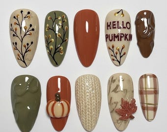 Presse citrouille d'automne faite main sur les ongles, nail art feuilles d'automne