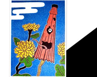 May include: A colorful print featuring a red and black umbrella-like creature with a long tongue, set against a blue background with yellow flowers and white clouds. The artwork has a traditional Japanese aesthetic.