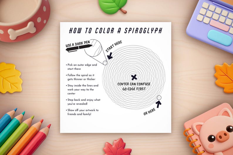 Peut inclure: Une feuille de papier carr&eacute;e blanche avec des instructions sur la fa&ccedil;on de colorier un spirographe, entour&eacute;e de crayons de couleur, d'un bol pour chien et de feuilles d&eacute;coratives. Le texte dit "Comment colorier un spirographe".