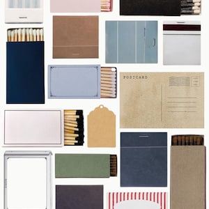 May include: Assortment of matchboxes with various designs and colors, including blue, green, red, and white. Some matchboxes have a striped pattern, while others have a solid color. There are also some matchboxes with a postcard design and a digital camera.