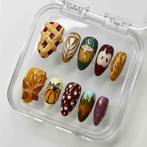 Uñas postizas de otoño hechas a mano: Uñas de almendra con diseño de pastel de calabaza en 3D