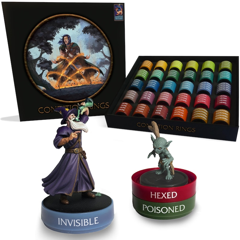 May include: A Contion Rings game set with a box featuring a fantasy illustration. Includes figurines of a wizard and a goblin, and a tray of colorful rings. The wizard figurine base reads "INVISIBLE". The goblin figurine base reads "HEXED POISONED".