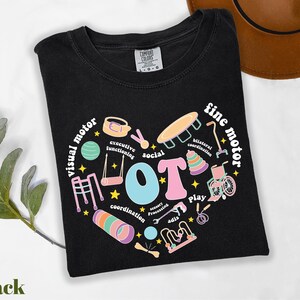 a t - shirt with the word love written in it