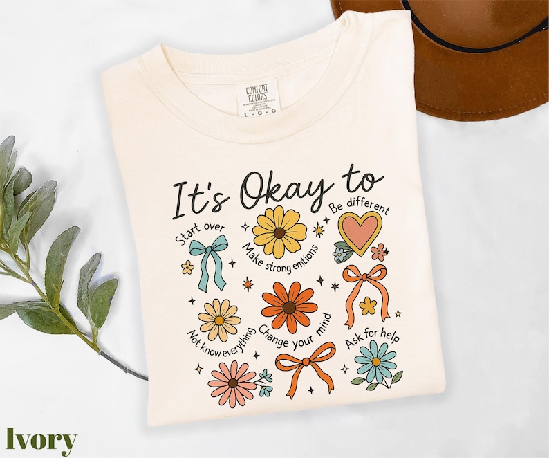 a t - shirt that says it's okay to be different