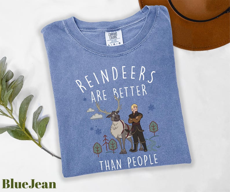 a blue tshirt with a picture of a man and a woman on it
