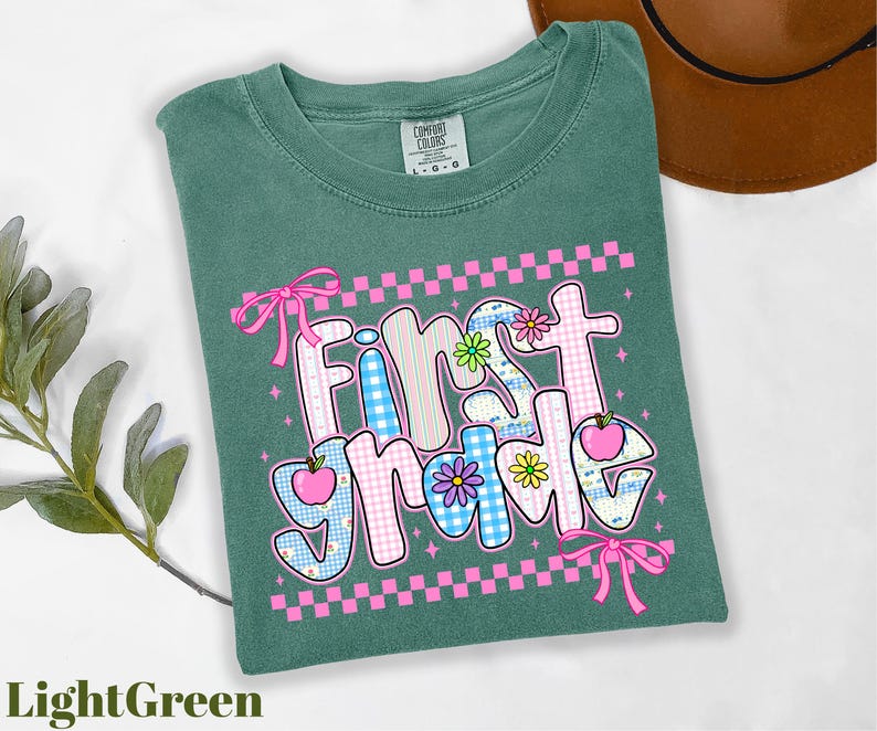 a t - shirt with the words first home on it