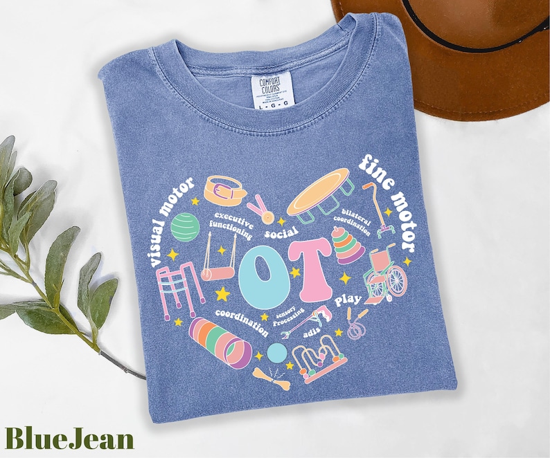 a blue t - shirt with a picture of a heart with the words i love