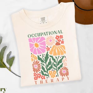 a t - shirt with an image of flowers on it