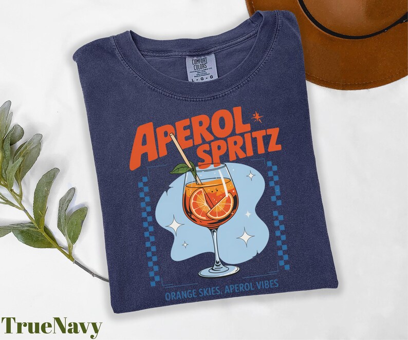 a t - shirt with an orange slice on it