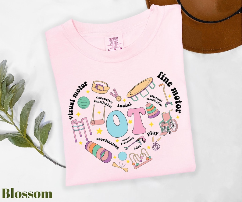 a pink t - shirt with the words happy birthday written on it