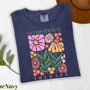 a t - shirt with a picture of flowers on it