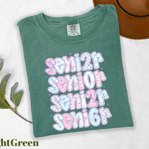 a green t - shirt with the words senior senior senior senior senior senior senior senior