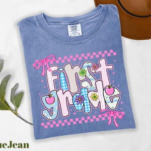 a t - shirt with the words first time printed on it