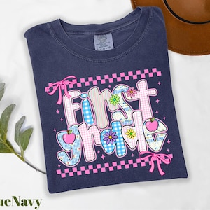 a t - shirt with the words first time printed on it