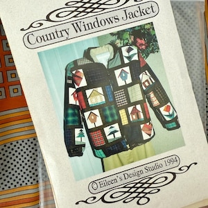 May include: A pattern for a "Country Windows Jacket" is displayed. The jacket design features a patchwork of squares with house and tree motifs. The pattern is from Eileen's Design Studio 1994.