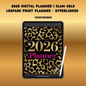 May include: A digital tablet displays a 2026 digital planner with a leopard print design. The planner features gold text on a black background, with the word "Planner" in pink. A white stylus rests on the right side of the tablet.