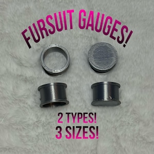 May include: Four gray fursuit gauges in two different styles and three sizes. The text "FURSUIT GAUGES!" is in pink and purple above the gauges. Below the gauges, the text "2 TYPES! 3 SIZES!" is in pink and purple.