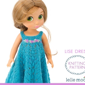 May include: A blue knitted dress with a floral trim, designed for a doll. The dress is called "Lise Dress" and is a knitting pattern from "Lelle Moda".