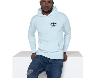 May include: A light blue hoodie with a black and white logo featuring a skier and the text "Snow Team" and "Est. 2023".