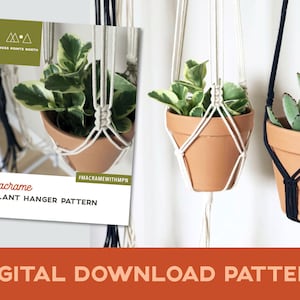 May include: A digital download pattern for a macrame plant hanger. The pattern is from Moss Points North and includes instructions for making a macrame plant hanger. The image shows two plant hangers, one white and one black, with plants hanging from them.