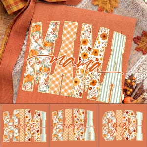 May include: An orange fabric background featuring the word MAMA in large block letters with varied patterns including pumpkins, autumn leaves, orange gingham, and green stripes, overlaid with the cursive text mama in a burnt orange colour.