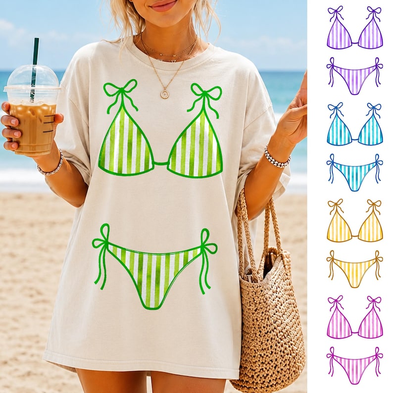 May include: A beige t-shirt with a green and white striped bikini design. The image also shows bikini sets in purple, blue, yellow, and pink. The person is holding a coffee drink and a woven tote bag on a beach.