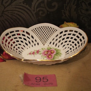 May include: A set of three ceramic mugs with a speckled, matte finish in cream, light grey, and dark grey. Each mug has a simple, minimalist design, suitable for coffee or tea.