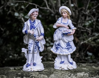 Vintage porcelain figurines Victorian boy with violin and girl with flower basket blue and white/ Porcelain woman figurine