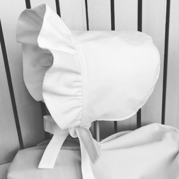 white cotton baby bonnet