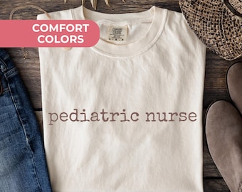 Camiseta de colores cómodos para enfermeras pediátricas, camiseta de agradecimiento para enfermeras de la UCI pediátrica, camiseta floral para pediatras, lindo atuendo de equipo de enfermeras pediátricas con flores